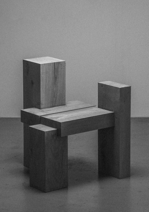 Cubistic Chair | 7365 by Arne Kristian: Minimalist design with oak wood beams forming an abstract, blocky chair. Handcrafted in the Netherlands, balancing art and function.