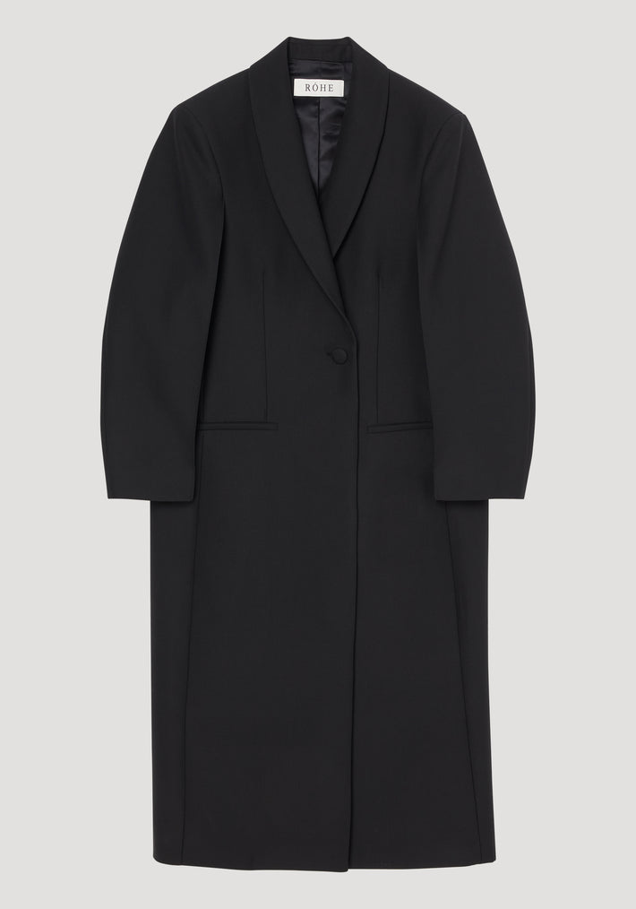 Signature opera coat | black: Full-length, single-breasted overcoat with shawl collar, single waist button, slit pockets, and interior label RÓHE. Tailored for elegant layering.
