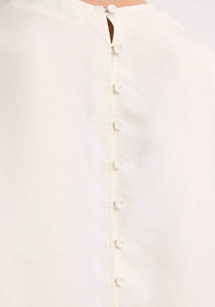 Buttoned silk top | cream