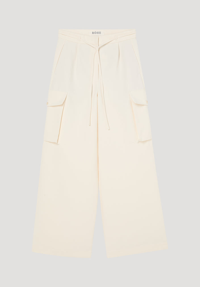 Tailored cargo trousers in off white with wide-leg fit, featuring a drawstring waist, side flap pockets, and belt loops, made from 100% recycled polyester.