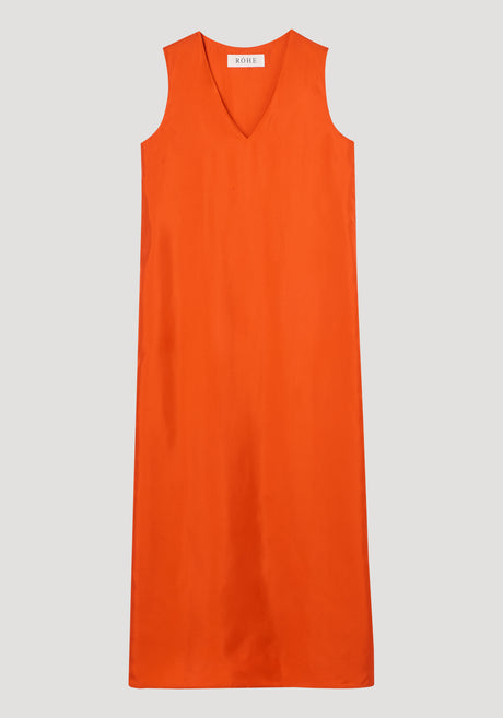 V-neck silk dress in burnt orange, sleeveless and full-length, with a relaxed silhouette and RÓHE label at the neckline, crafted from 100% silk.