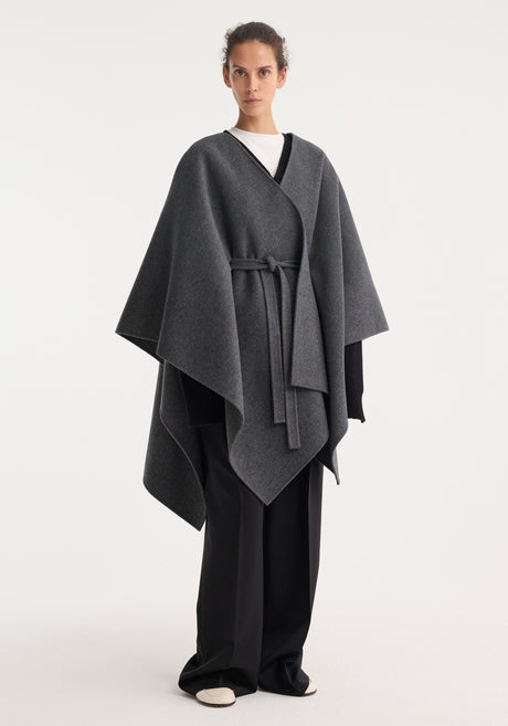 Double-faced belted poncho in mid grey melange, featuring a wrap style, wide sleeves, and a tie waist, crafted from a wool-cashmere blend.