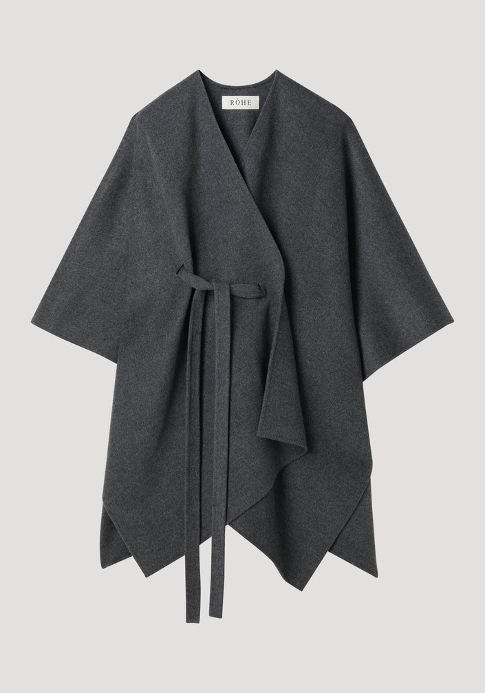 Double-faced belted poncho in mid grey melange, featuring a wrap style, wide sleeves, and a tie waist, crafted from a wool-cashmere blend.