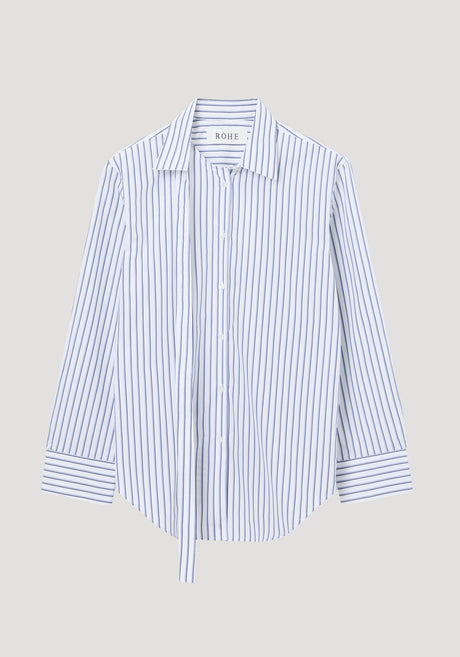 Deconstructed striped shirt featuring a white and navy pinstripe pattern, classic collar with deconstructed detailing, button cuffs, and a slightly curved hem.