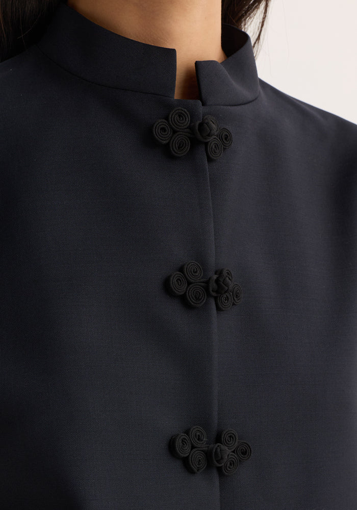 Mandarin jacket | navy, featuring a close-up of its Mandarin collar with pankou closures and detailed coiled-cord fastenings, crafted from virgin wool and mohair blend.