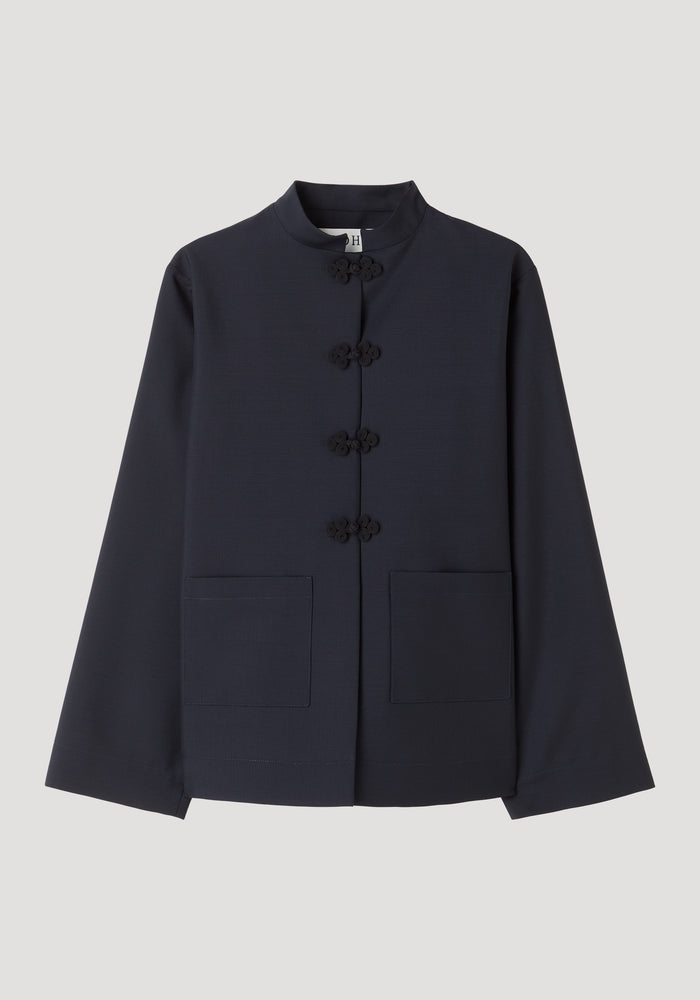 Mandarin jacket | navy: Traditional Chinese-inspired design featuring pankou closures, long sleeves, patch pockets, and a minimalist silhouette in a virgin wool-mohair blend.