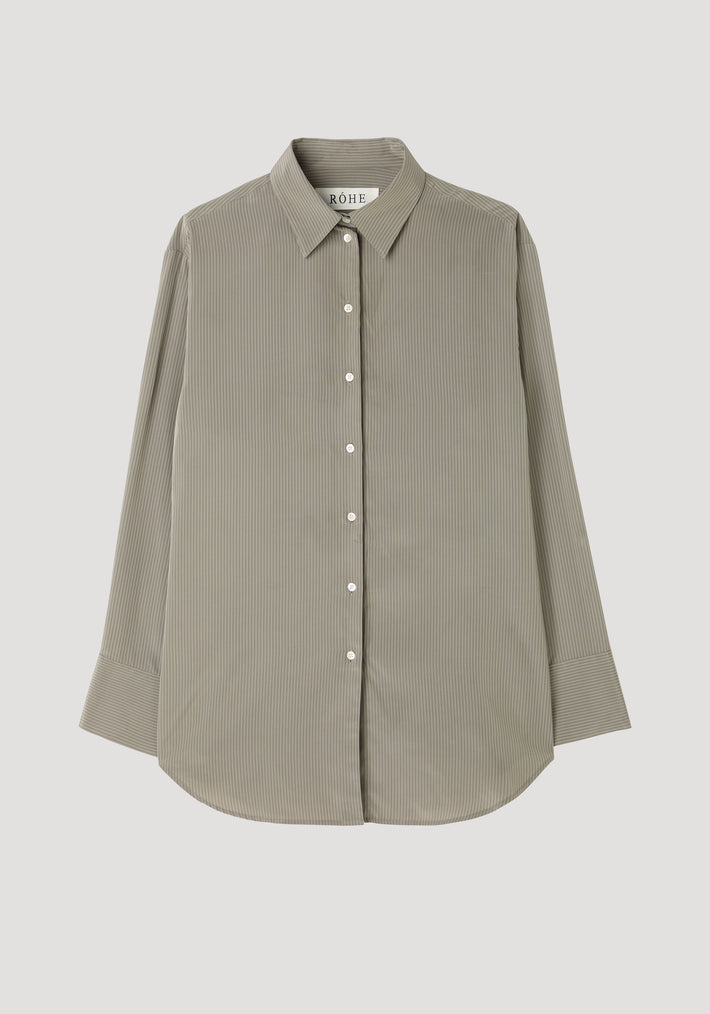 Relaxed shaped shirt with fine pinstripes, featuring a classic collar, button placket, elongated sleeve plackets, rounded hem, and mother-of-pearl buttons, laid flat.