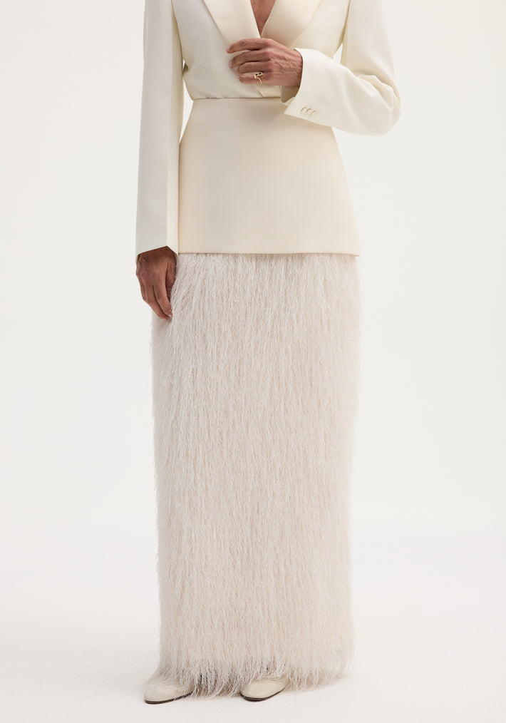 Ivory Fringe skirt with high-waist, full-length fringe detailing, and invisible zip, paired with an ivory blazer and cream pointed-toe shoes.