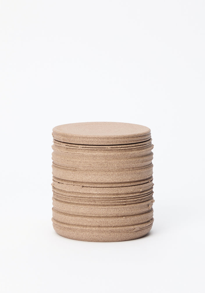 Diplomatico Scented Candle: Cork-colored discs stacked, each lid serves as a sage-burning coaster, housing a candle in a handmade ceramic vessel by Alex Gabriels.
