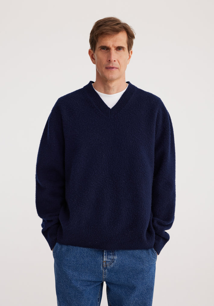 Relaxed boiled wool knitted V-neck | marine blue