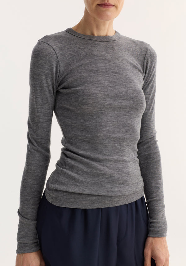 Fine merino long sleeve | mid grey melange, featuring a fitted silhouette with a crew neck. Made from 100% merino wool, it's easy to style and versatile.