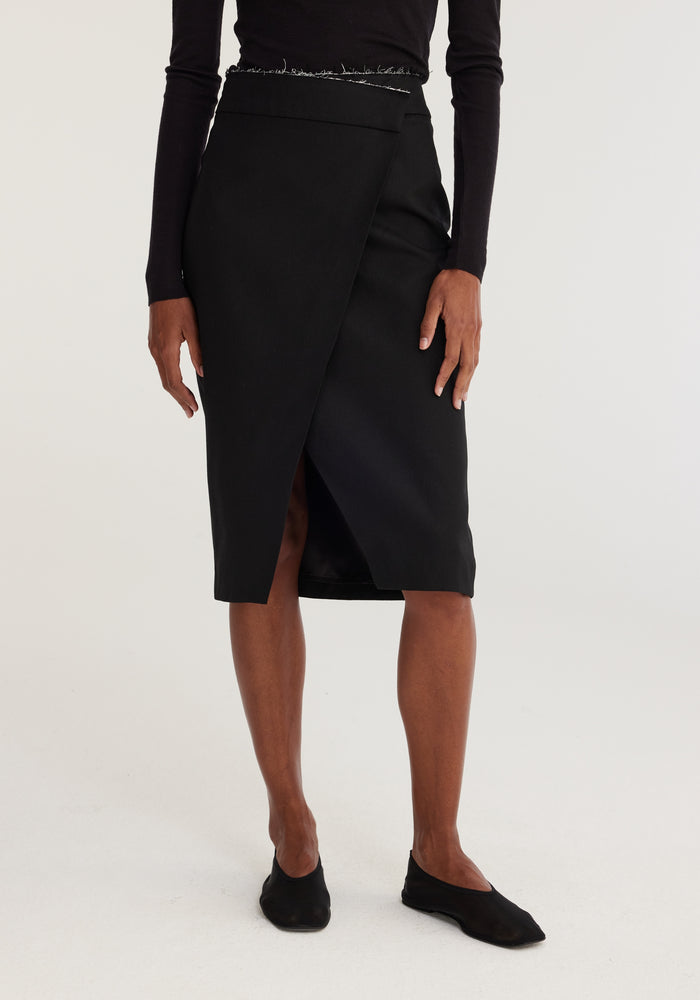 Raw edge knee-length skirt | noir
