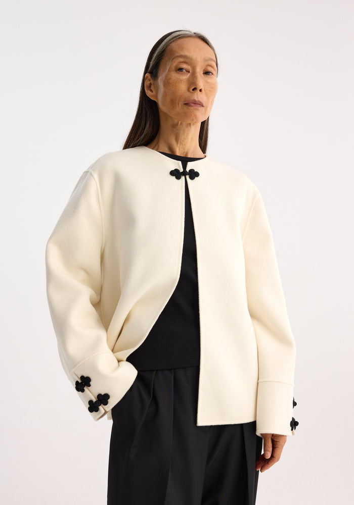 Double-faced cape jacket | off white