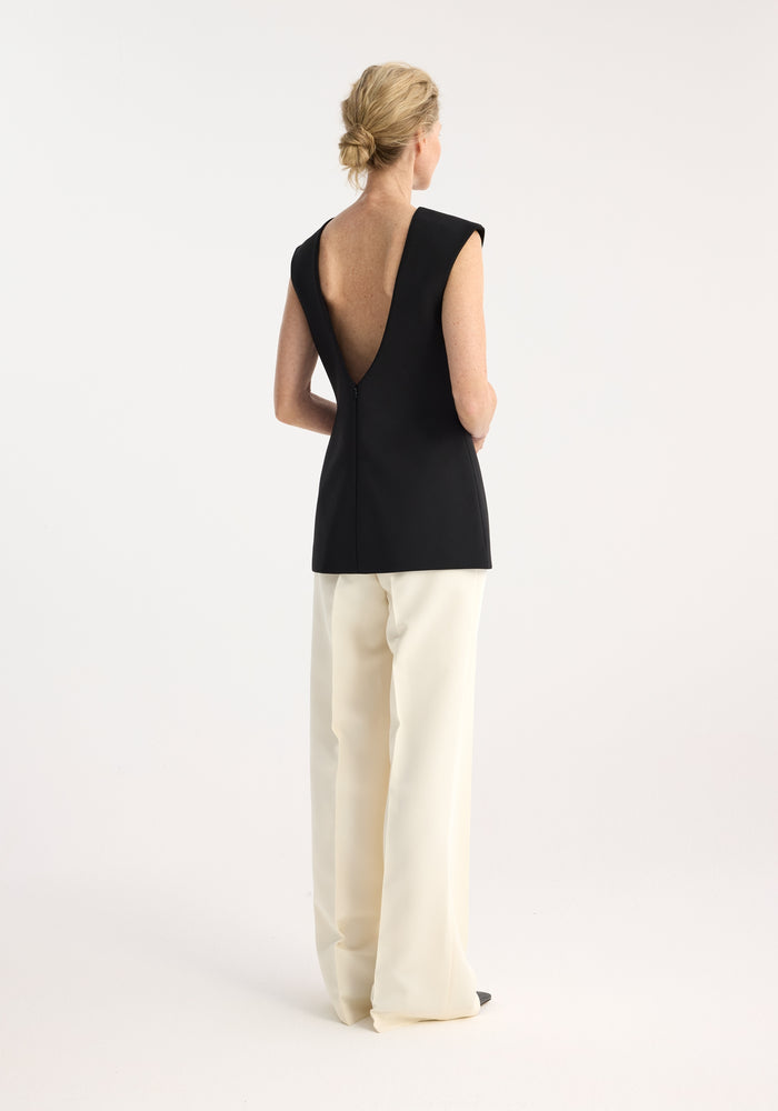 Sculptural open back top | black