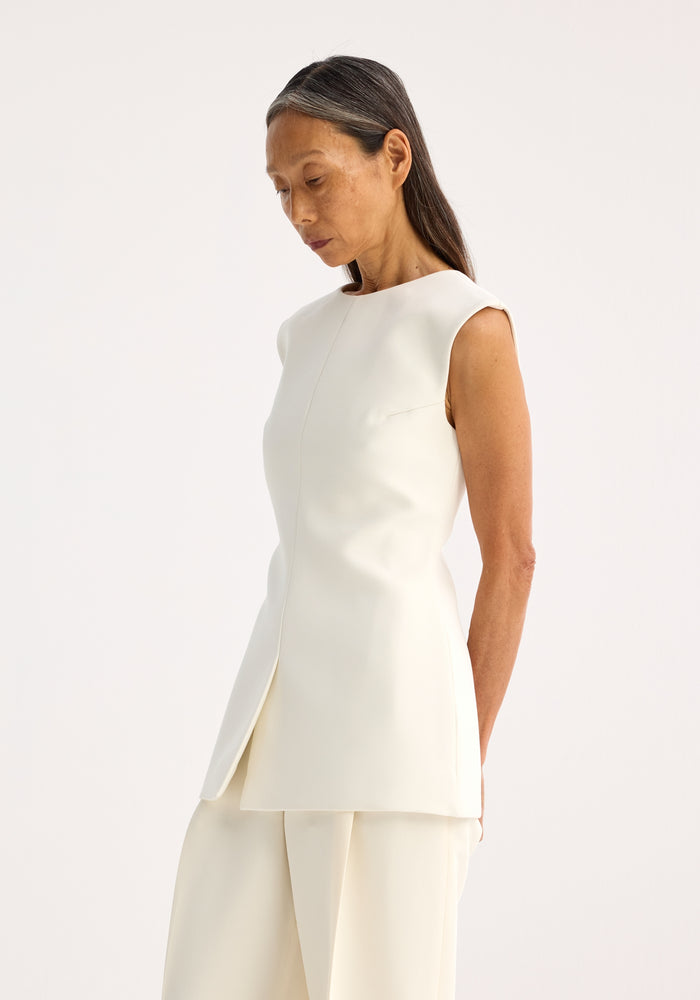 Sculptural open back top | cream