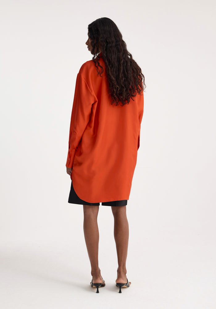 Signature elongated silk shirt | burnt orange