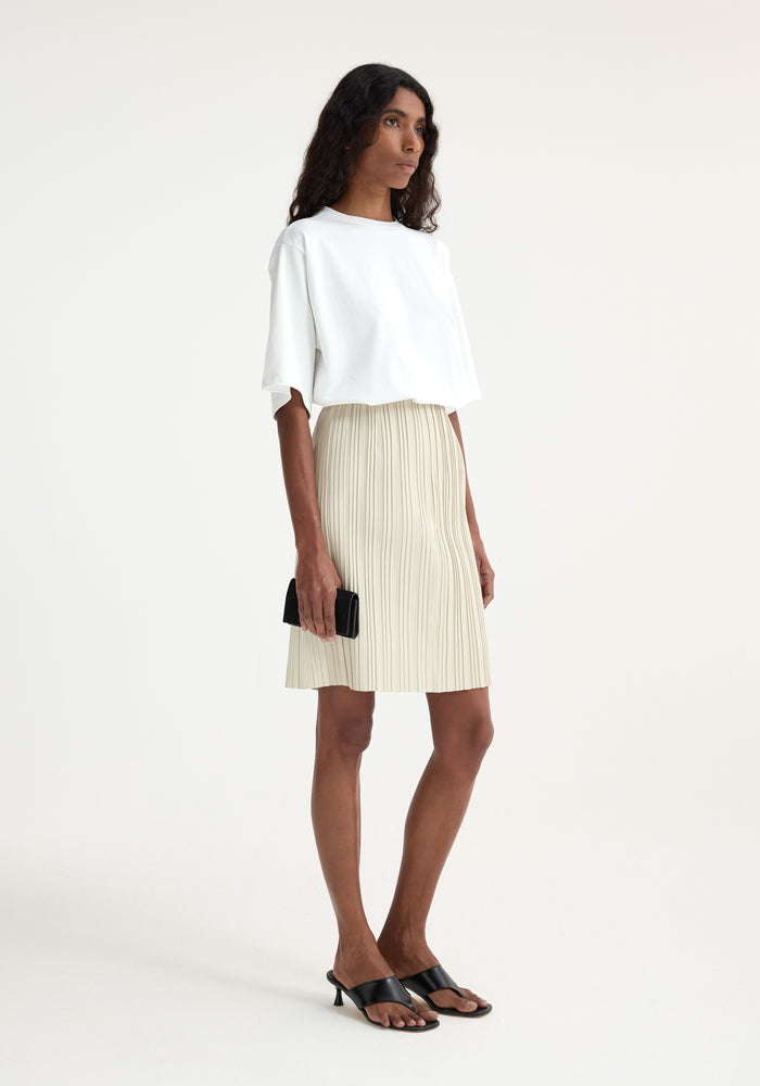 Plissé leather skirt | chalk