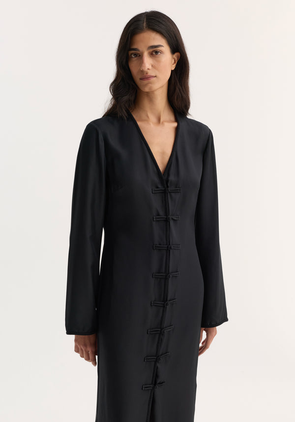 Mandarin silk dress in black with deep V-neck, pankou closures, long sleeves, and high front slit, crafted from 100% silk for luxurious elegance.
