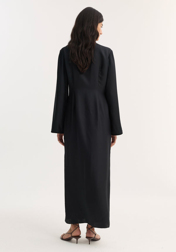 Mandarin silk dress | black, featuring a full-length design with pankou closures, v-neckline, high front split, worn by a model viewed from behind.
