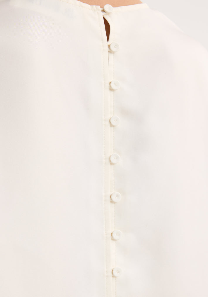 Buttoned silk top | cream