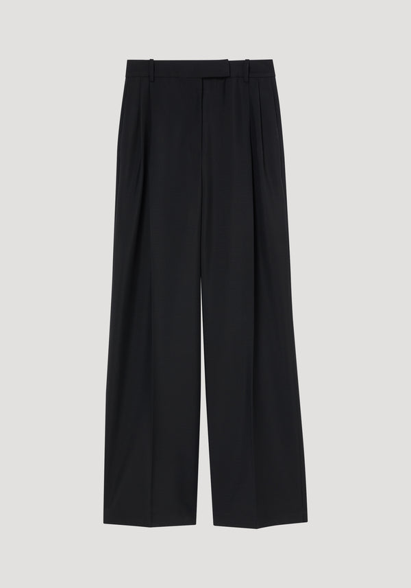 Mid-waist tailored trousers in black, featuring high-waisted wide-leg design with belt loops and subtle front pleats, crafted from virgin wool and mohair blend.