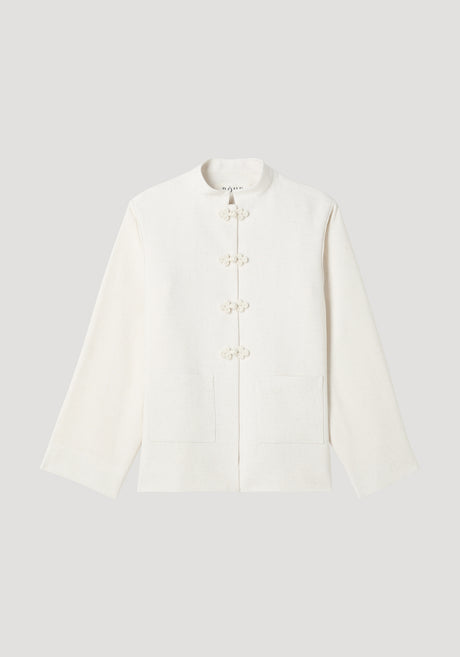 Mandarin jacket | winter white with a boxy cut, stand-up collar, frog closures, patch pockets, and wide sleeves. Made from a textured silk blend fabric.