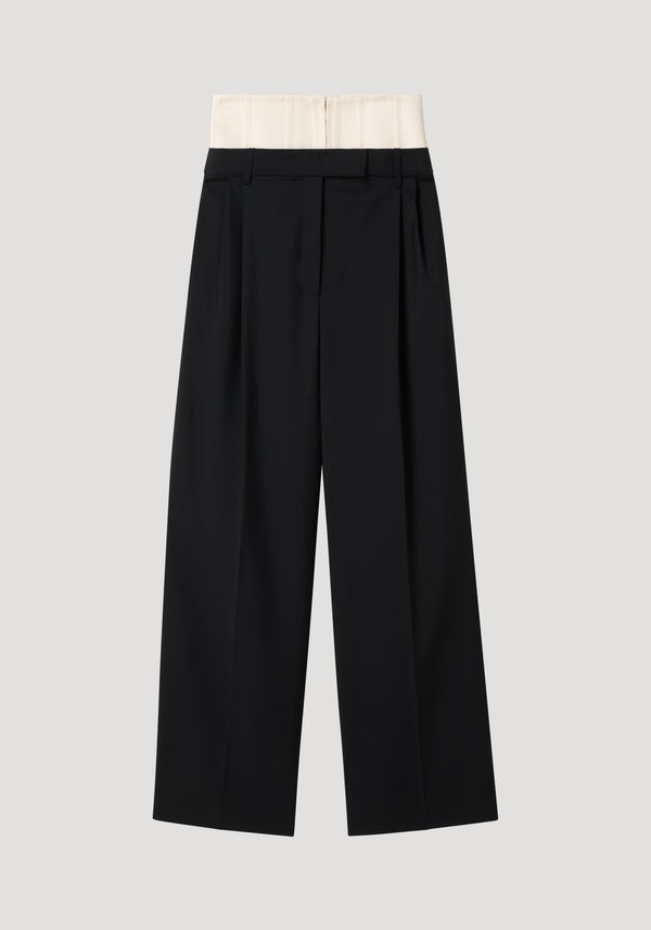 Corset trousers in black, featuring a high-waisted, wide-leg design with a cream corset-style waistband, crafted from a structured wool-mohair blend.