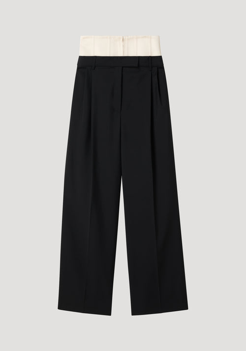 Black high-waisted corset trousers with tailored wide-leg design and a contrasting beige corset-style waistband, flat front, and belt loops.