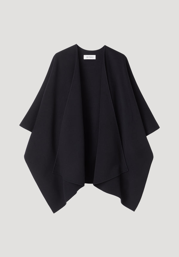 Draped scarf poncho in black, featuring an open-front waterfall style with a small RÖHE label at the neckline, crafted from 100% wool.