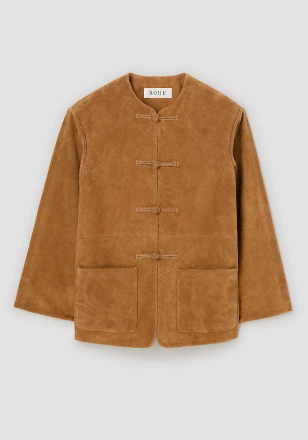 Mandarin textured suede jacket in cognac with pankou closures, embroidered edges, and patch pockets. Signature Róhe 'Marie' design made from 100% cow leather.