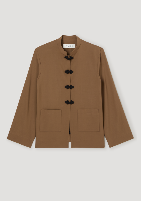 Mandarin Jacket | mocha featuring long sleeves, mandarin collar, five black pankou closures, two patch pockets, and a “RÓHE” label at the neck.