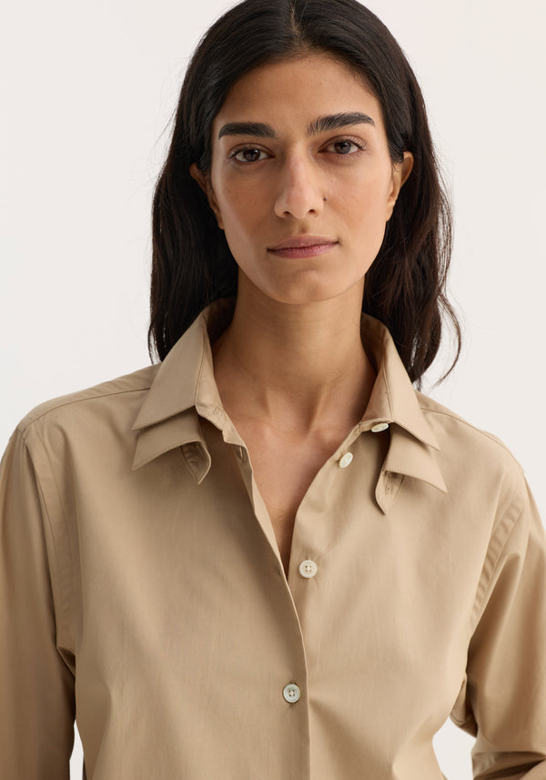 Woman wearing Double Collar Shirt | Wheat, showcasing its relaxed fit and detachable collar. Crafted from 100% cotton with clean lines and timeless style.