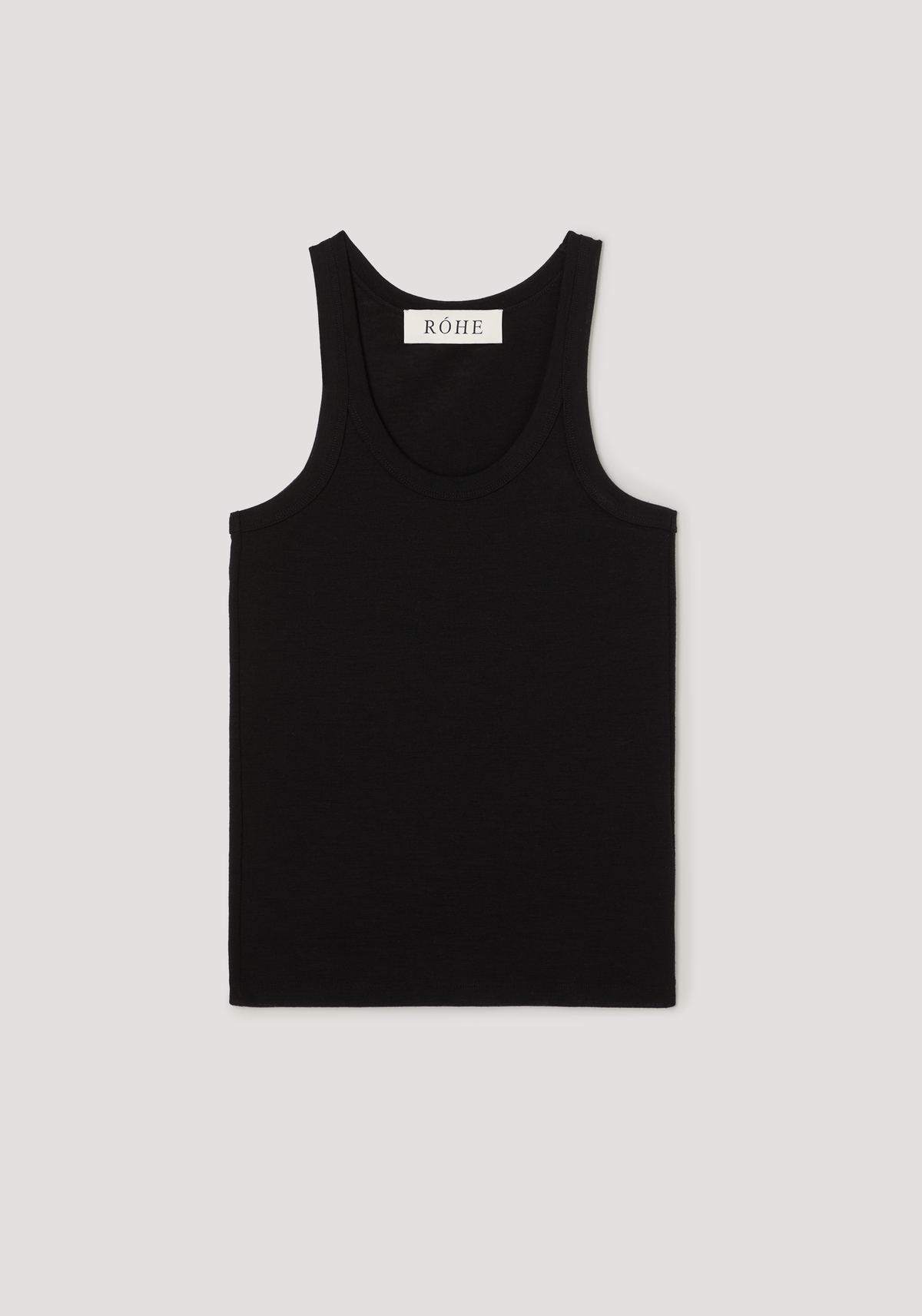 Merino scoop neck top | black: A sleeveless, solid-black tank top with a scoop neck and narrow straps, featuring a “RÓHE” label inside the back neckline.