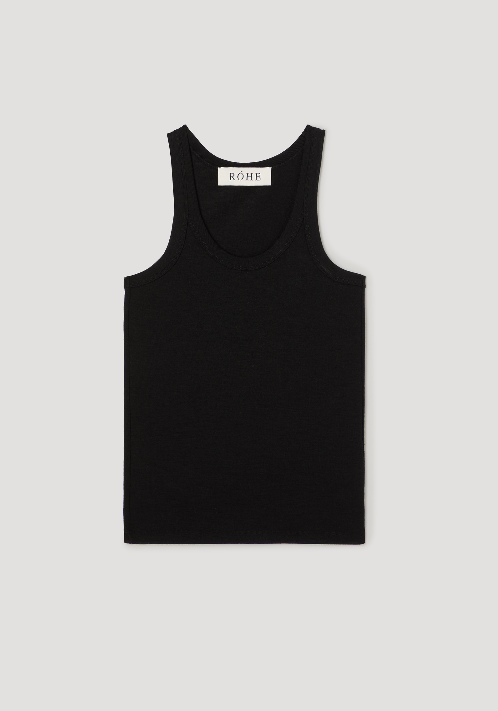 Merino scoop neck top | black: A sleeveless, solid-black tank top with a scoop neck and narrow straps, featuring a “RÓHE” label inside the back neckline.