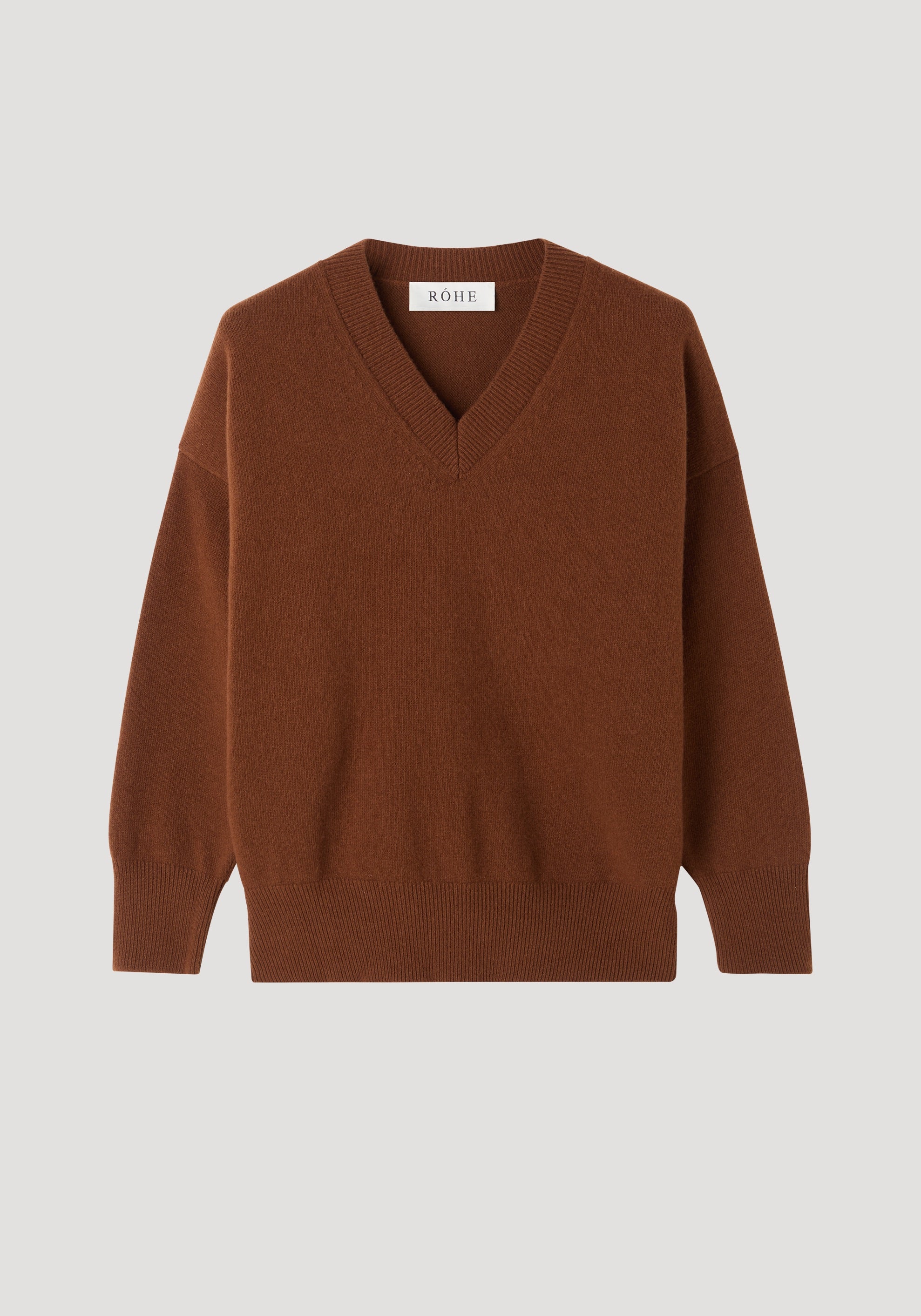 V-neck knitted jumper | rust