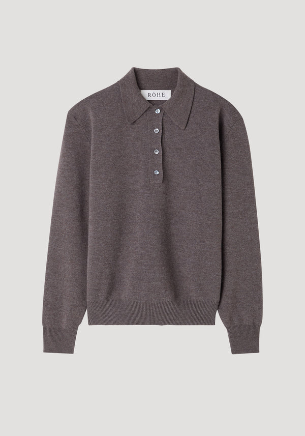 Compact knitted polo in mud melange featuring a long-sleeve, polo-style collar, three-button placket, and ribbed cuffs, crafted from a wool-cashmere blend.