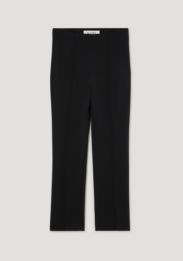 Cigarette leg trousers in black, featuring a sleek, ankle-length design with a pressed front crease and high-rise fit, crafted from stretch fabric for comfort.