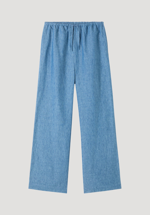 Relaxed fit trousers in ocean blue, featuring wide-leg design, elasticized waistband with drawstring, side seam pockets, crafted from 100% linen for breathable comfort.