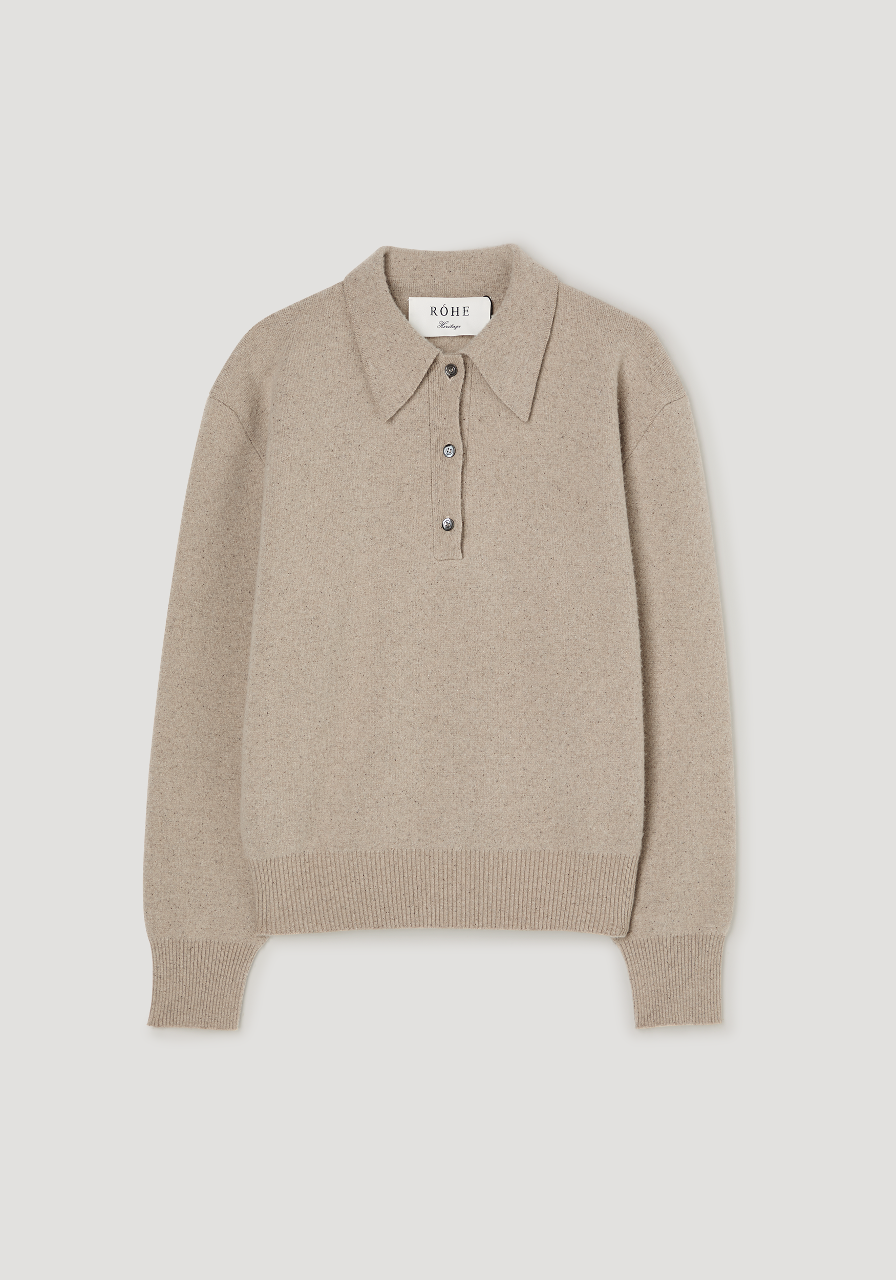 Wool cashmere polo | stone melange: A soft, oatmeal-beige knit pullover with a pointed collar, three-button placket, and ribbed details, featuring a relaxed, timeless design.