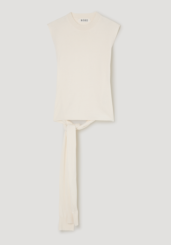 Open back knitted wrap top with crew neckline and sash-style sleeve extensions for waist tie, featuring a sleeveless, off-white design by RÓHE.