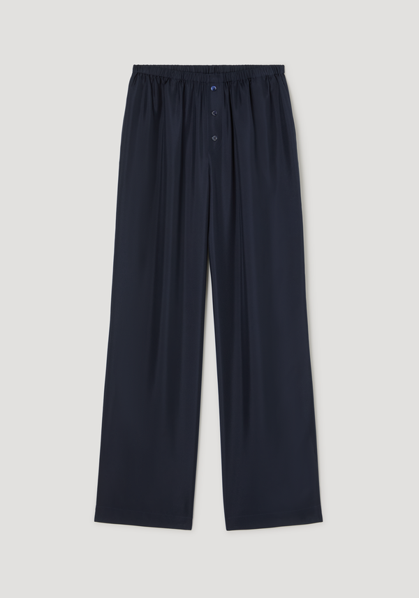 Relaxed silk trousers | night: Wide-leg pants with elastic waistband, faux two-button front, made of pure silk. Model wearing size 34, 177cm tall.
