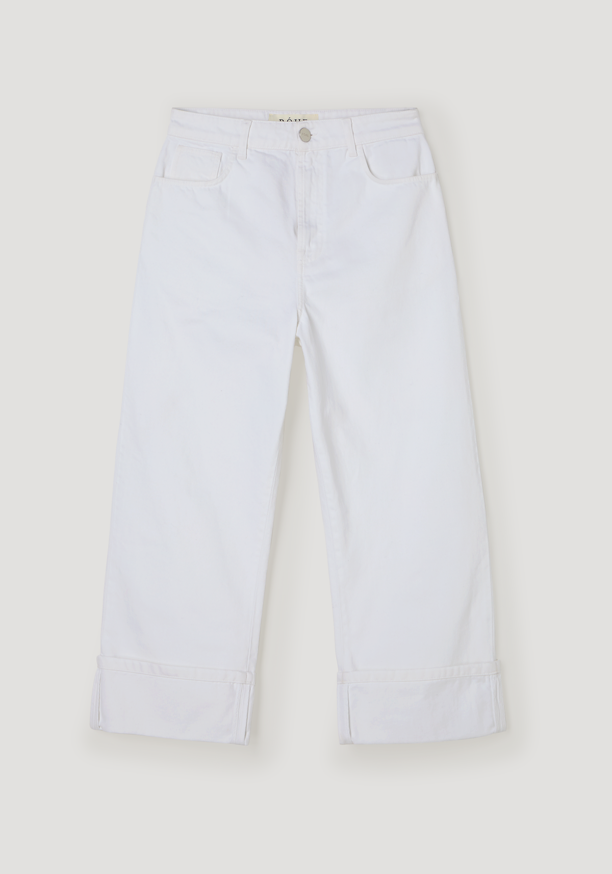 Baggy fit turn-up denim in optic white, featuring a low-rise waist, straight legs with cuffs, and a branded metal button closure.