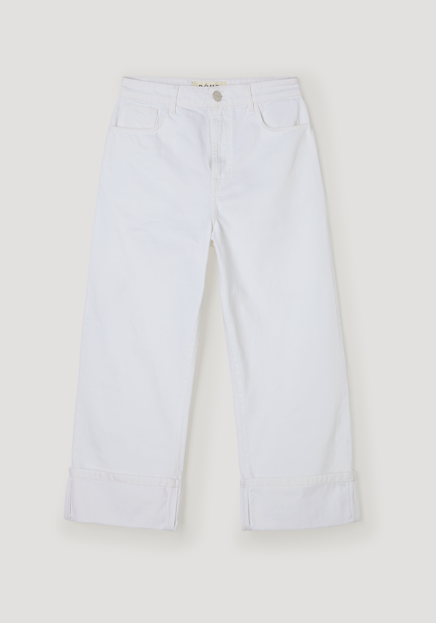 Baggy fit turn-up denim in optic white, featuring a low-rise waist, straight legs with cuffs, and a branded metal button closure.