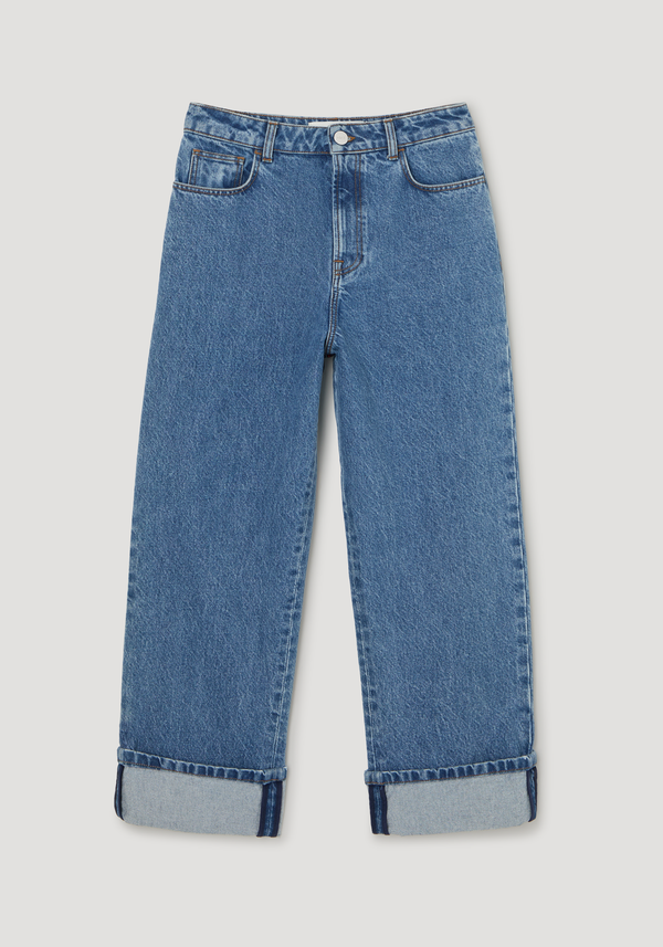Turn-up baggy denim | heritage blue with straight legs, rolled cuffs, front pockets, and branded button. High-waisted cut crafted from 100% cotton.
