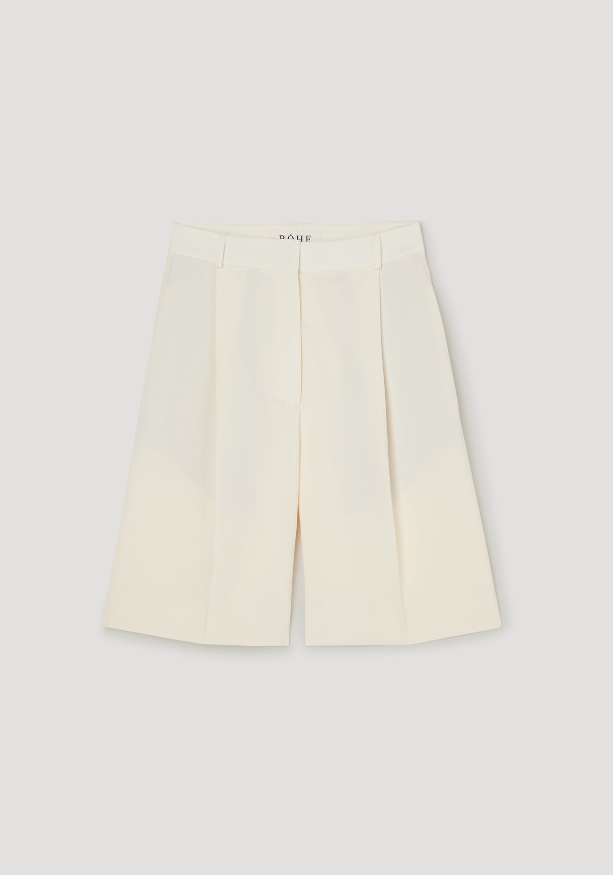 Tailored single pleat shorts | off white featuring high-waisted design, knee-length cut, wide-leg culottes style, and side pockets, crafted from 100% virgin wool.