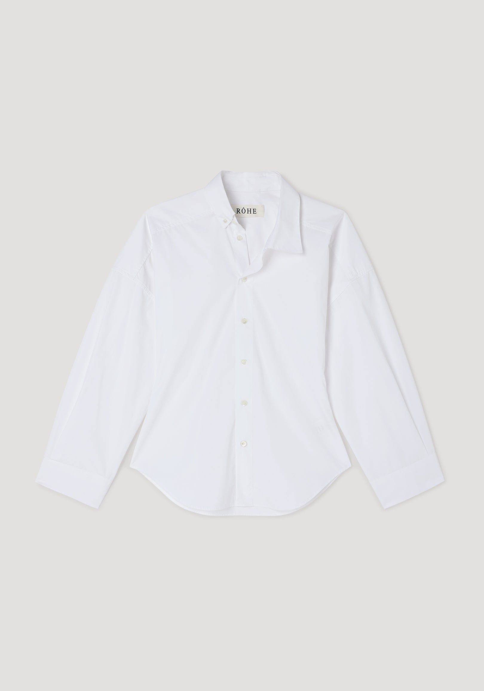 White long-sleeve shirt with an uneven collar design and button-down front, displayed flat on a light background, Poplin uneven collar shirt | optic white.