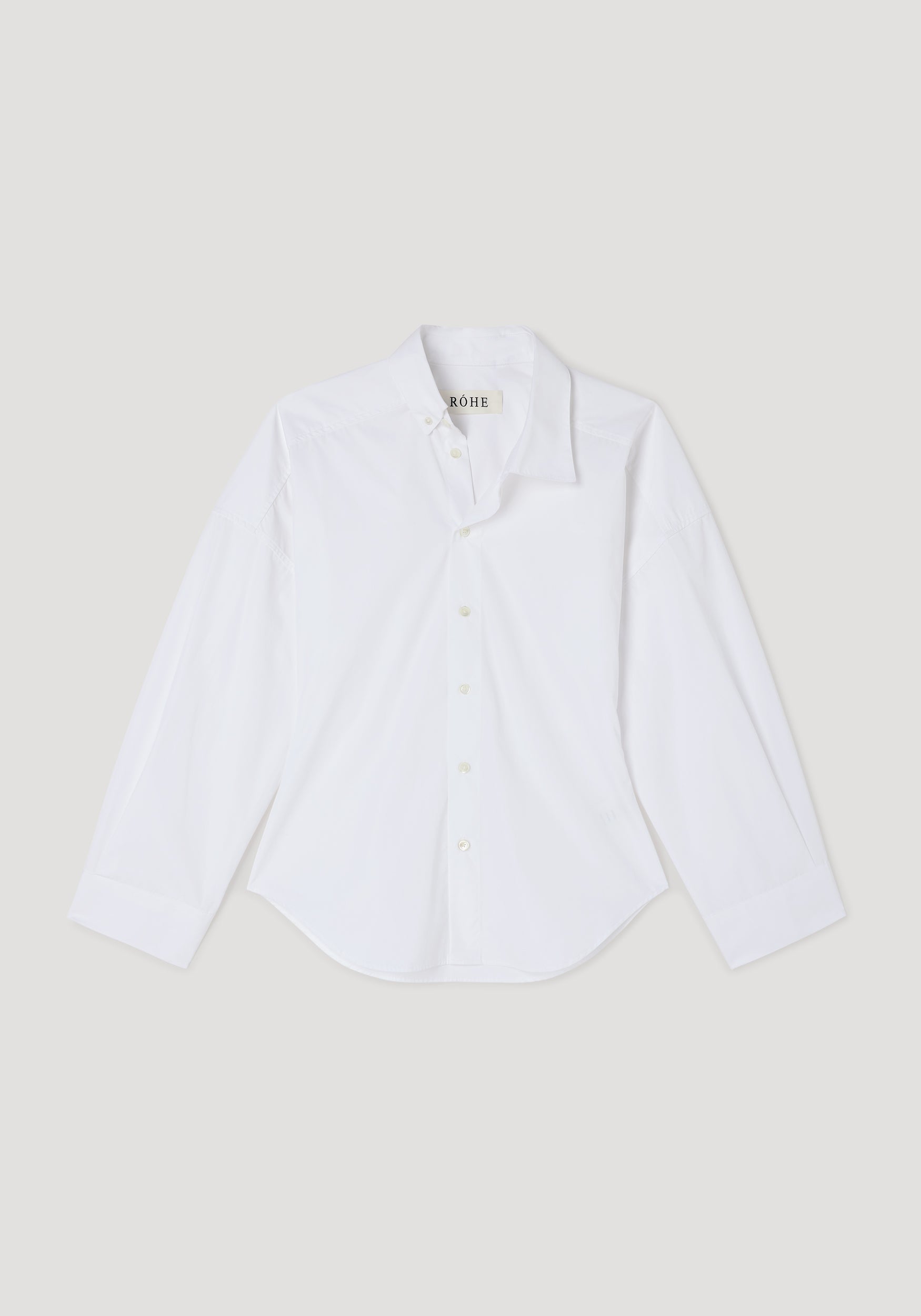 White long-sleeve shirt with an uneven collar design and button-down front, displayed flat on a light background, Poplin uneven collar shirt | optic white.