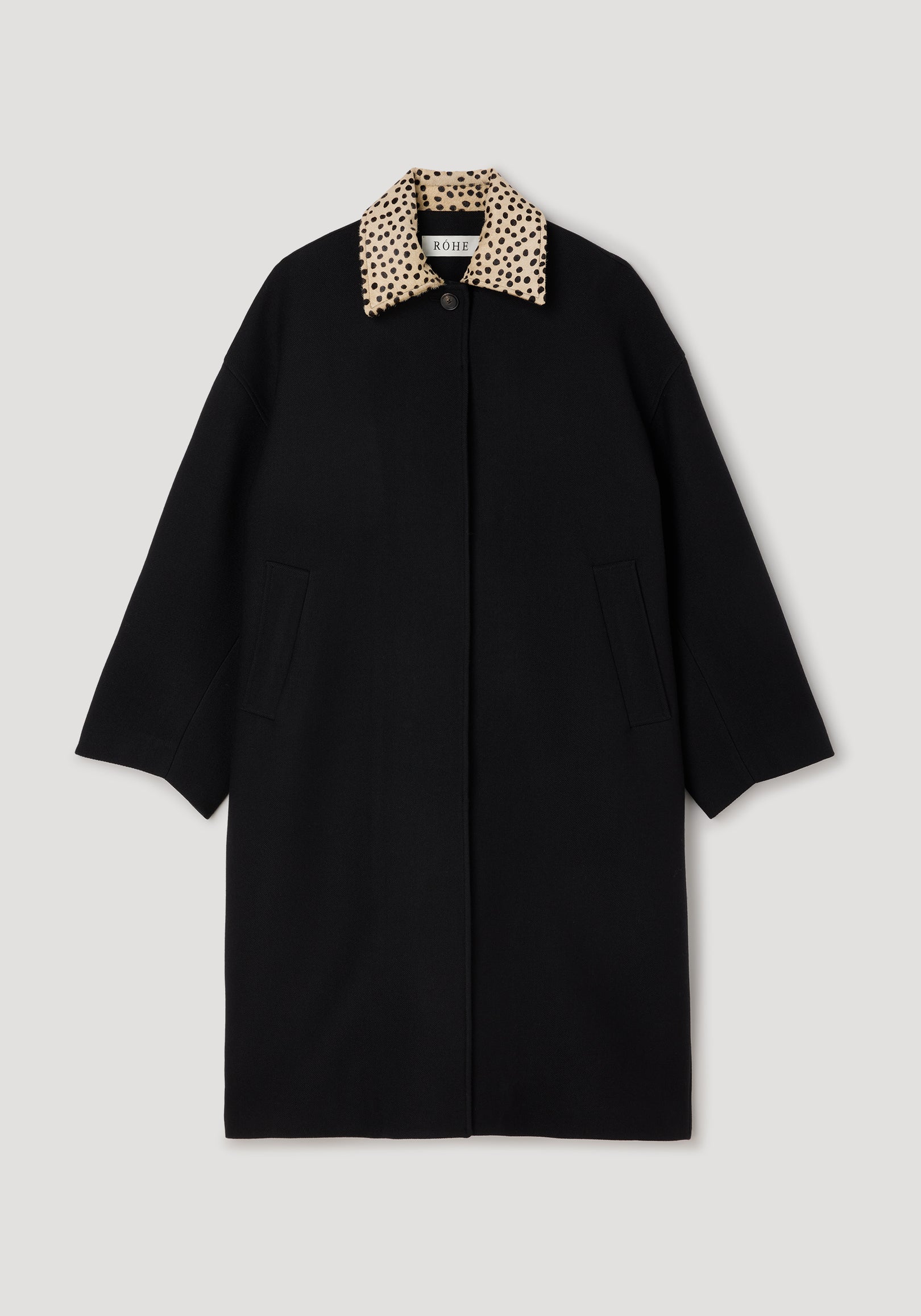 Cheetah collar wool coat | black displayed flat, featuring a long black wool body with a contrasting cheetah print collar and side pockets.