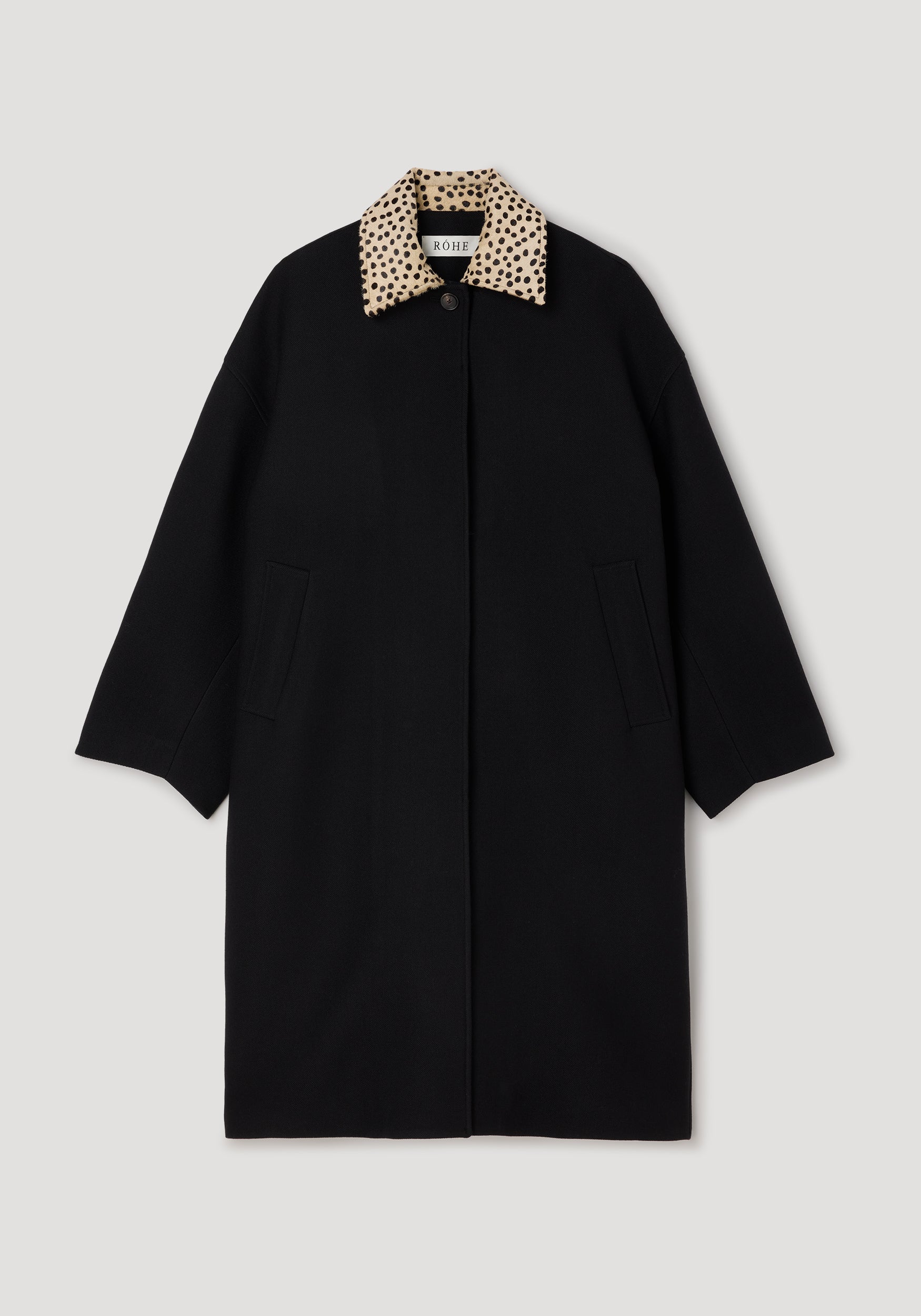 Cheetah collar wool coat | black displayed flat, featuring a long black wool body with a contrasting cheetah print collar and side pockets.