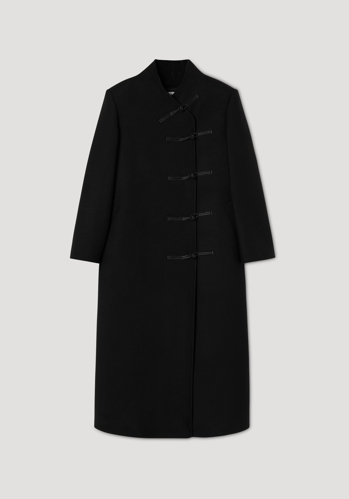 Black long wool coat with pankou closure fastenings, featuring a high collar and a clean, tailored silhouette, named Pankou closure wool coat | black.
